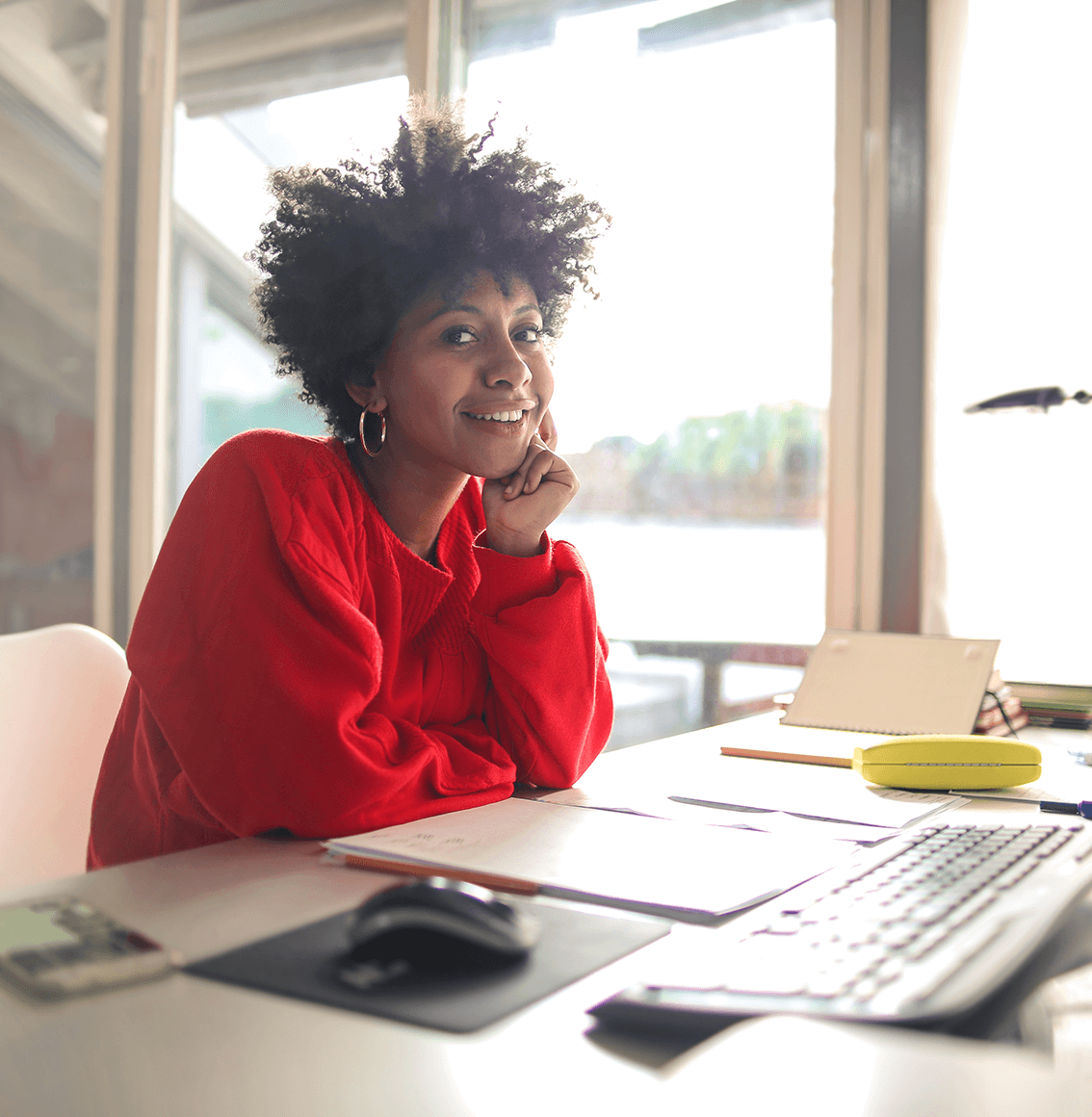Smiling girl at desk